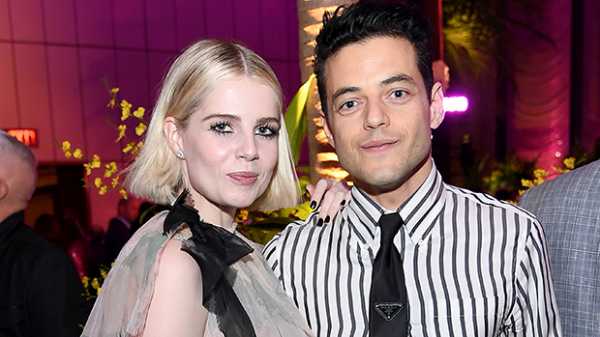 Rami Malek & Lucy Boynton Couple Up In Rare Appearance As He Supports Her At ‘The Politician’ Party