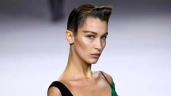 Bella Hadid Rocks Dramatic Eyebrows & Elvis-Inspired Hair On Runway During Paris Fashion Week — Pics