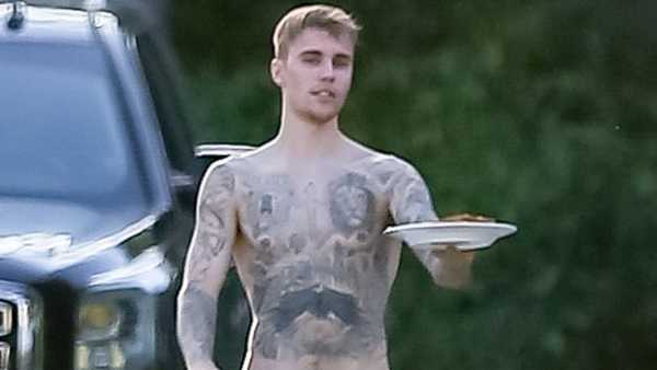 Justin Bieber Goes Shirtless & Shows Off His Muscular Tattooed Body As Wife Hailey Gushes Over Him