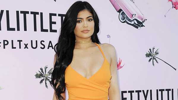 Kylie Jenner Poses Seductively In Sparkly Orange Jumpsuit Amid Travis Scott Split  