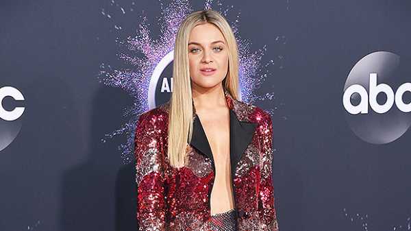 Kelsea Ballerini Shines In Sleek Suit With Nothing Underneath At AMAs