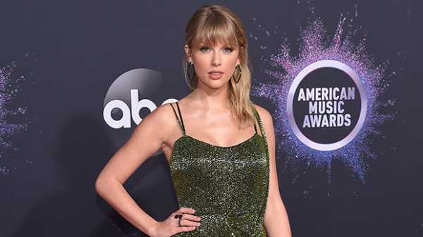 Taylor Swift Slays In A Sparkling Green Dress & Thigh-High Boots At AMAs