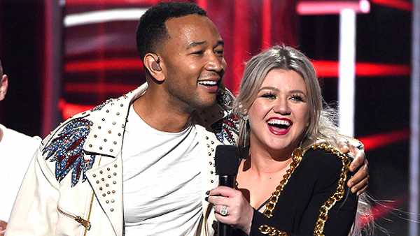 John Legend & Kelly Clarkson Officially Release Their ‘Baby It’s Cold Outside’ Duet With Updated Lyrics — Listen