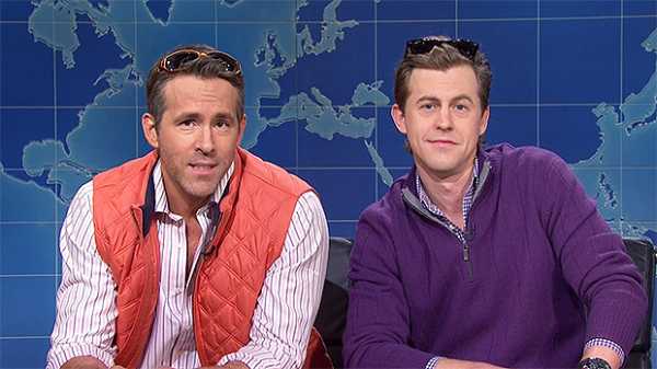 Ryan Reynolds Hilariously Crashes ‘SNL’s Weekend Update With Scarlett Johansson’s Fiancee Colin Jost