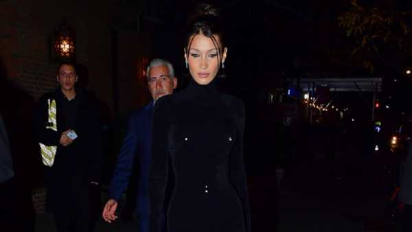 Bella Hadid Rocks Fake Body Piercings On Black Velvet Bodysuit In NYC