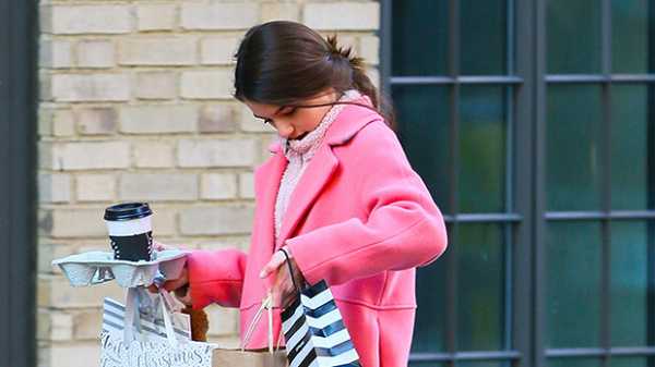 Suri Cruise, 13, Rocks Stylish Pink Coat & Looks Just Like Mom Katie Holmes While Shopping In NYC