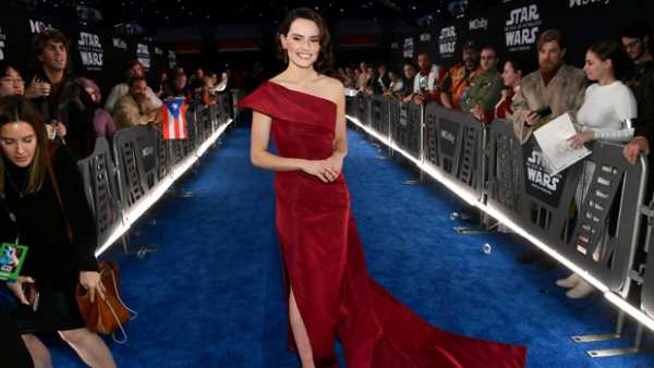 Daisy Ridley Looks Ravishing In Red Off-The-Shoulder Gown At ‘Star Wars’ LA Premiere — Pics