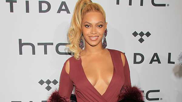 Beyonce Rocks Sheer, Plunging Red Dress & Sneakers While Promoting New Ivy Park Collection