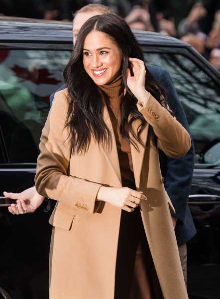 Meghan Markle Wears Brown Outfit and Shows PDA With Prince Harry for First Event of 2020