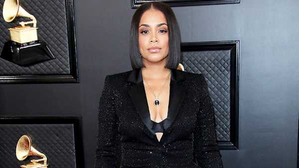 Lauren London Slays In Plunging Black Pantsuit On Grammys Red Carpet