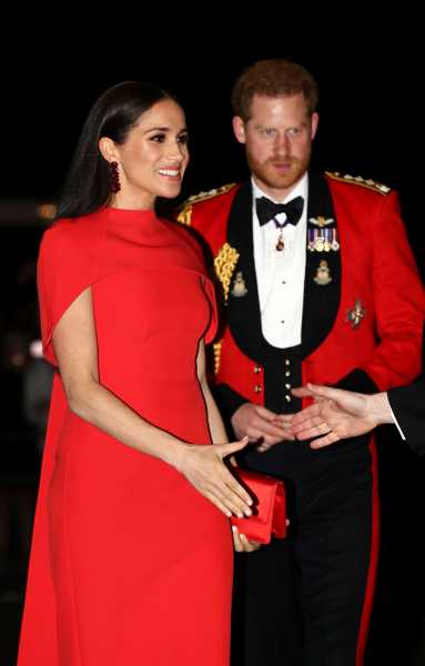 Meghan Markle Wears Red Cape Dress With Prince Harry at Mountbatten Festival of Music