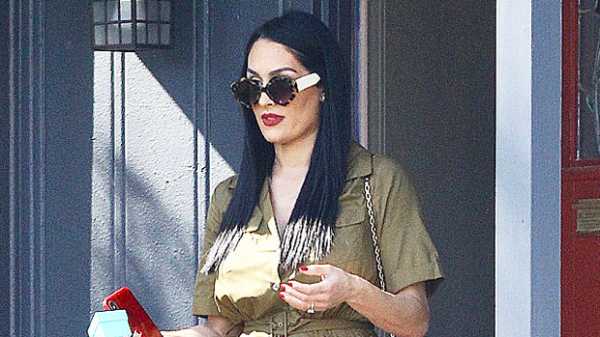 Nikki Bella Shows Off Her Baby Bump In Tight Red Dress To Celebrate ‘Total Bellas’ Premiere