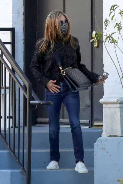 Jennifer Aniston Wears Black Sweater With Jeans at Hair Salon in LA