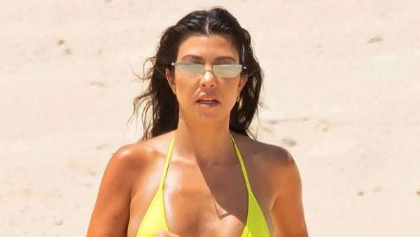 Kourtney Kardashian Devours A Burger In A Pink String Bikini While Posing Poolside — See Pic