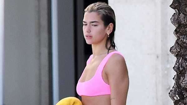 Dua Lipa Stuns In A Tiny Bikini & Open Button Down On Family Vacation To Albania – Photos