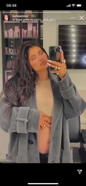 Kylie Jenner Shows Off Baby Bump in Tan Crop Top and Gray Jacket