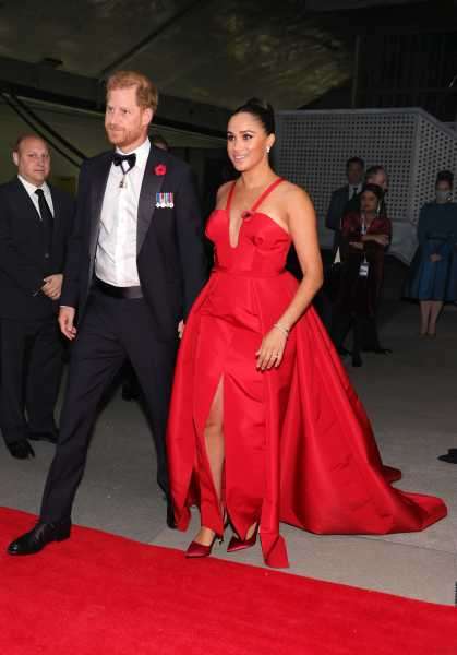 Meghan Markle Wears a Red Sleeveless Carolina Herrera Gown to Intrepid Museum NYC