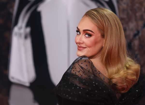 Adele Wears Black Sheer V-Neck Dress at BRIT Awards 2022