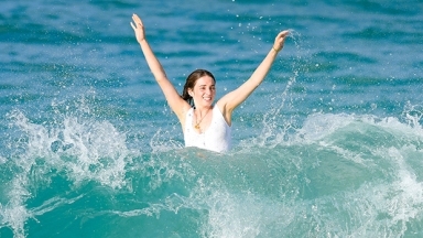 ‘Stranger Things’ Star Maya Hawke Slays In White One-Piece Swimsuit While Surfing In St Barths: Photos