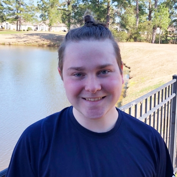 Ryan Buck, young man in front of a lake