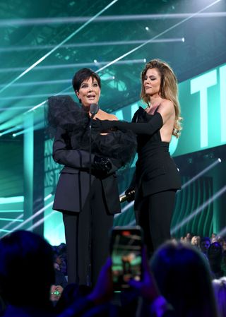 Khloé Kardashian and Mom Kris Jenner Twin in Suits to Accept Reality TV Awards