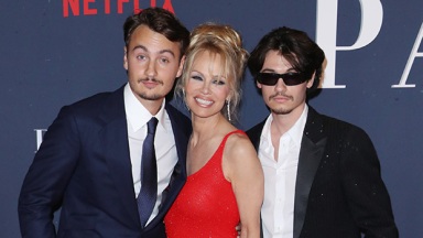 Pamela Anderson Stuns In ‘Baywatch’ Red Dress For Netflix Doc Premiere With Her 2 Sons