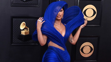 Cardi B Slays In Cutout Blue Gown & Matching Sheer Hood At The Grammy Awards