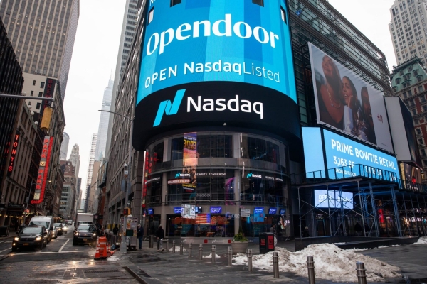 A monitor displays Opendoor Technologies signage in New York City