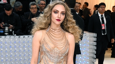 Amanda Seyfried Slays At The Met Gala In Nude-Look Mini Dress With Big ‘Mamma Mia’ Curls