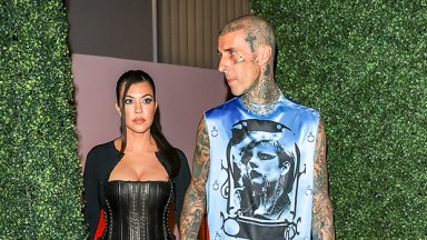 Kourtney Kardashian Cozies Up to Travis Barker Side Stage at Hardcore Concert: Watch