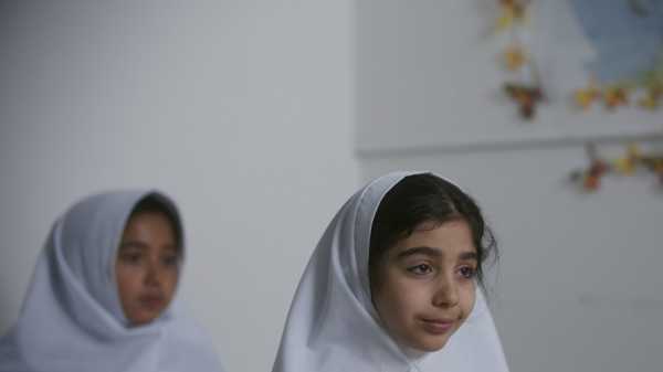 A Young Girl Questions Wearing a Head Scarf in “Rizoo”