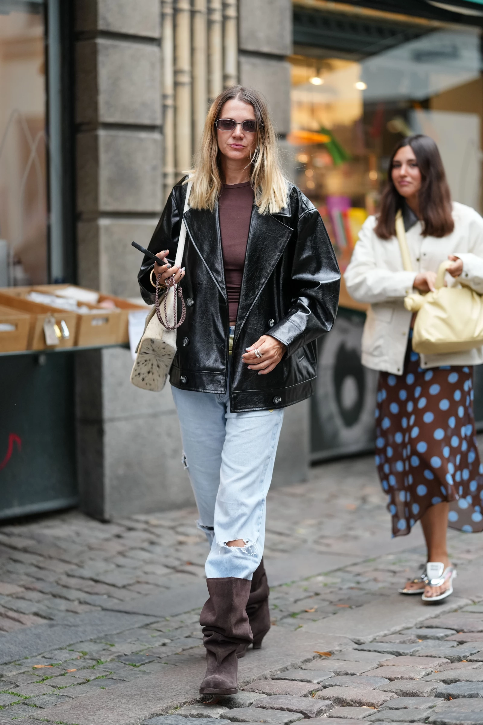 This autumn, fashion lovers are embracing jeans stuffed inside boots.
2