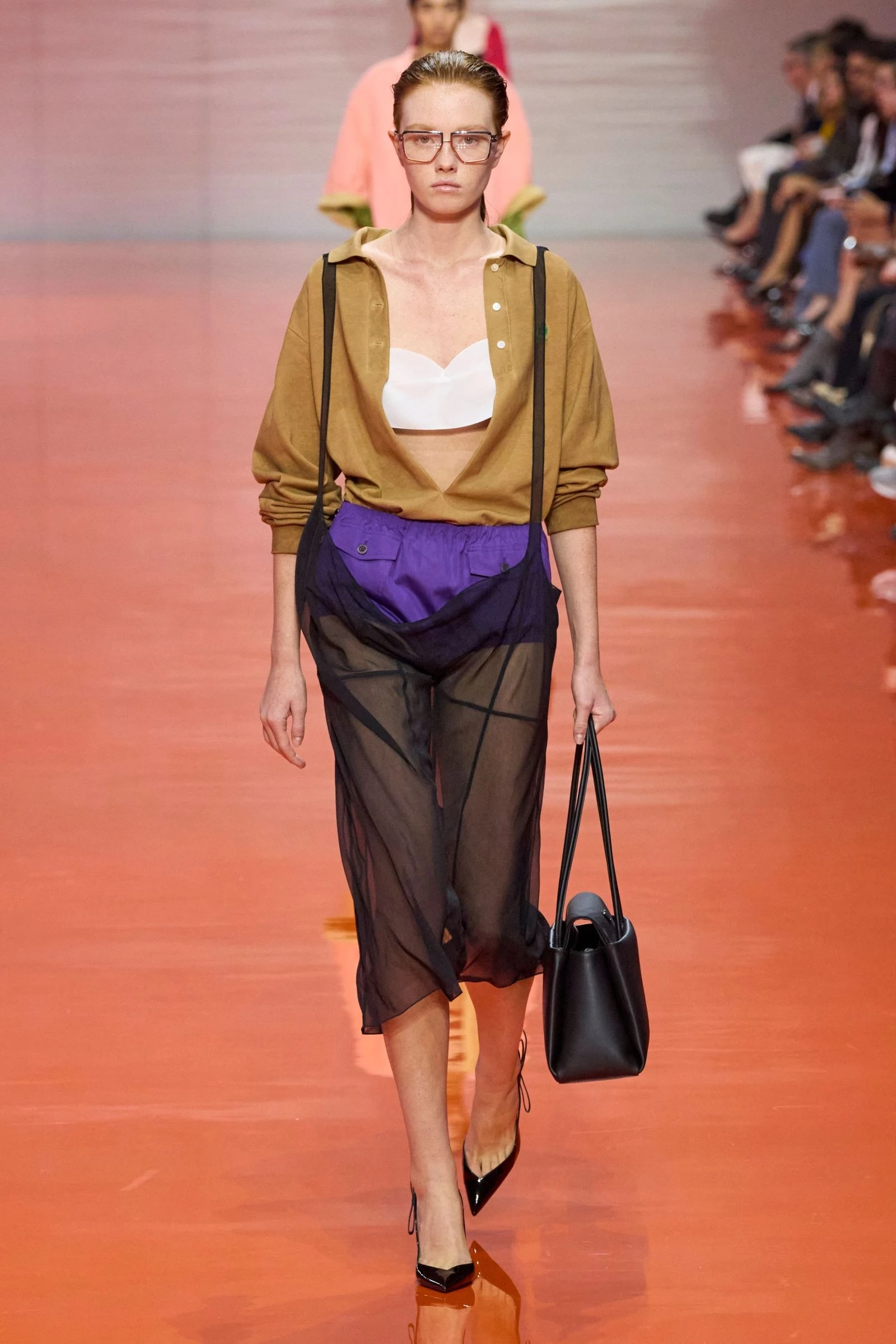 Prada's overall dress is the must-have item for spring/summer '26.
5