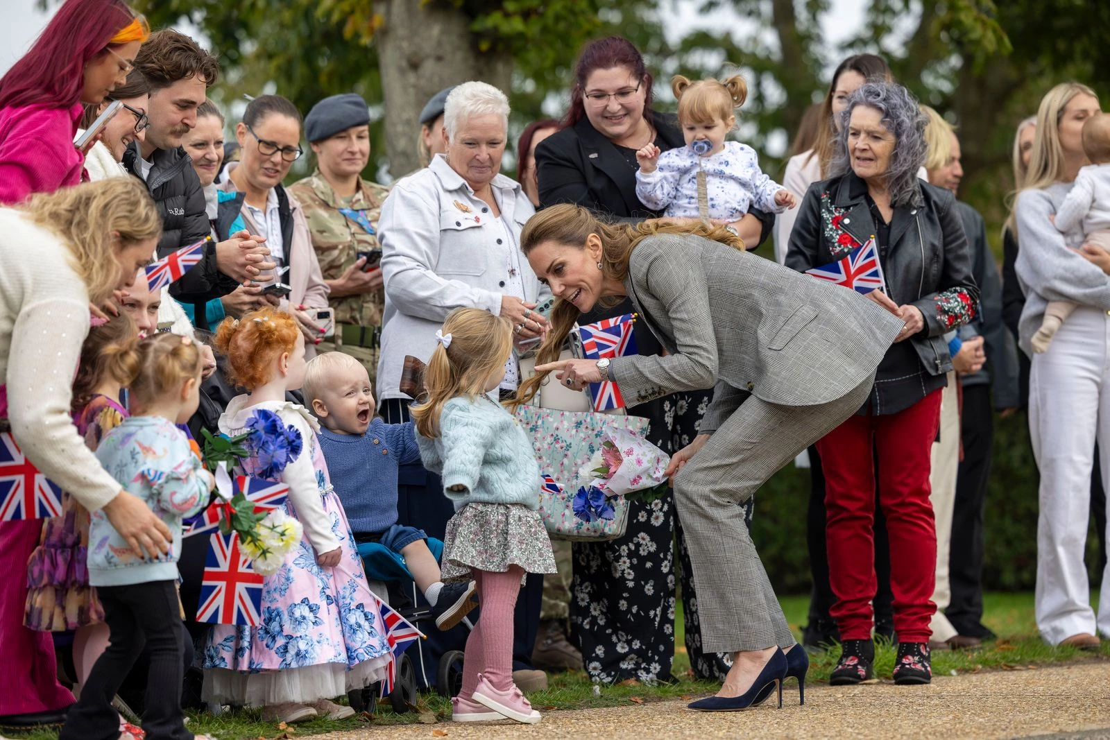 Your closet needs a Kate Middleton-esque suit.
1