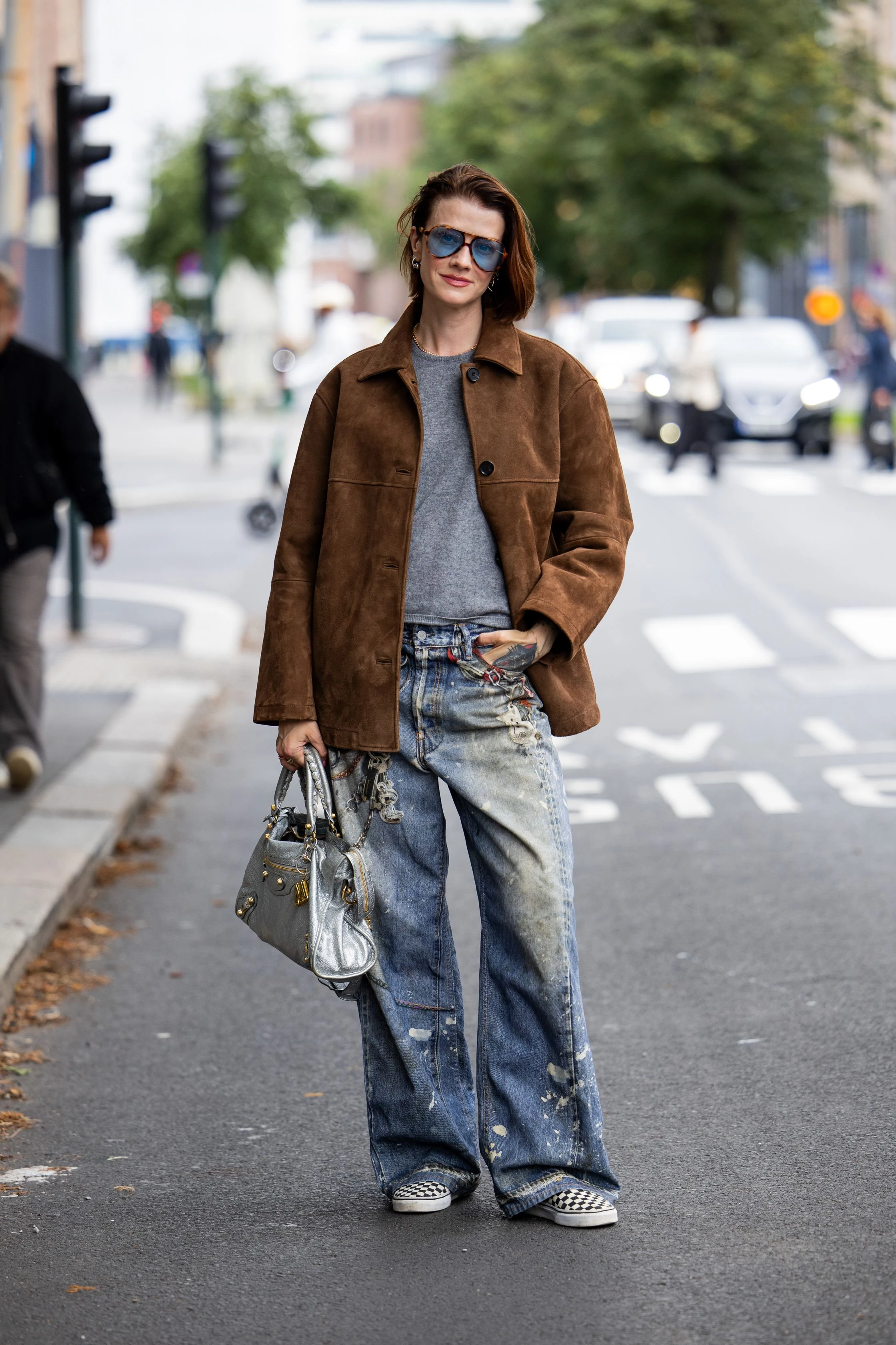 Checkerboard slip-ons: Fall 2025's must-have footwear.
1