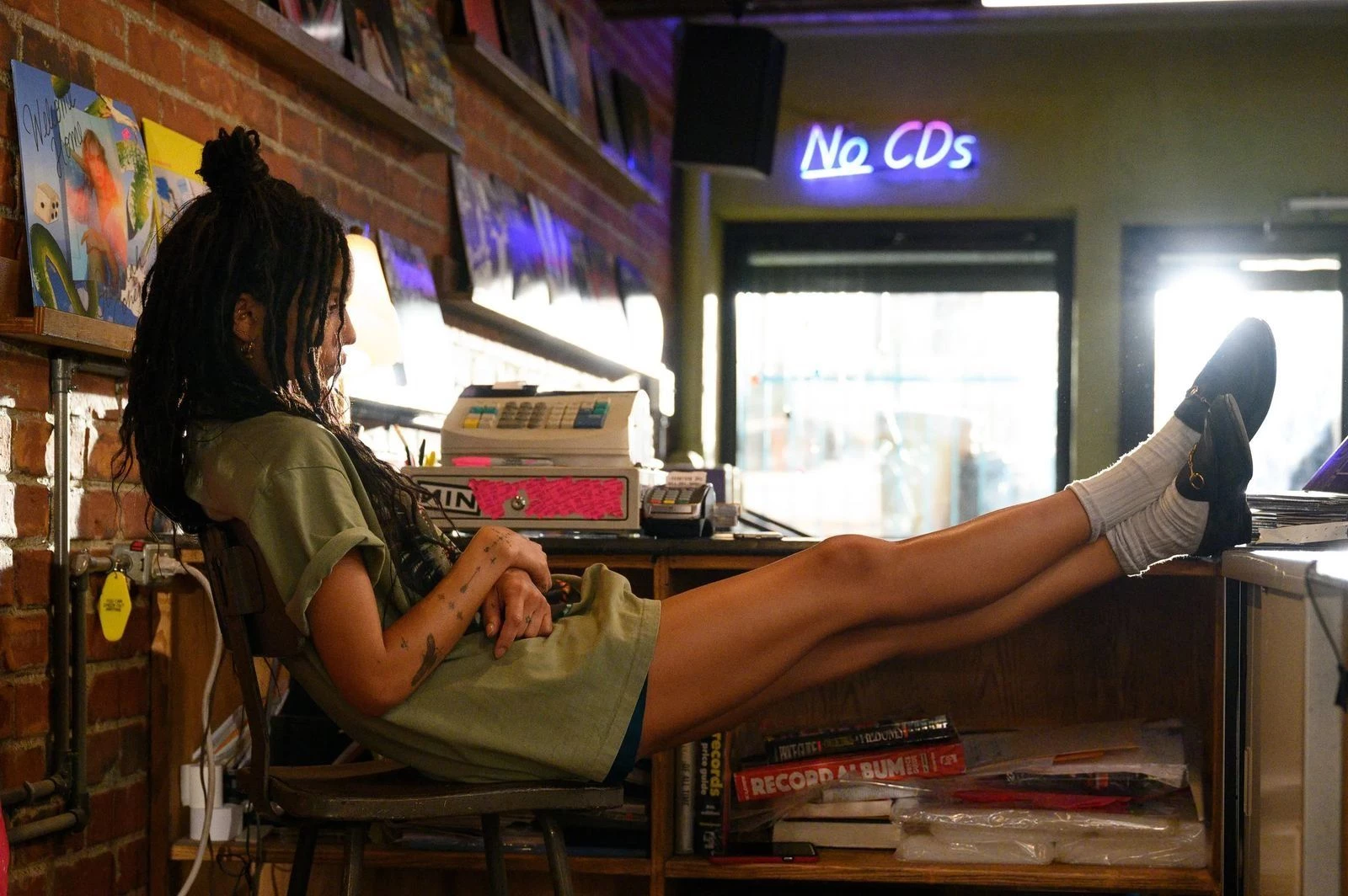 Zoe Kravitz in Gucci loafers in the series4