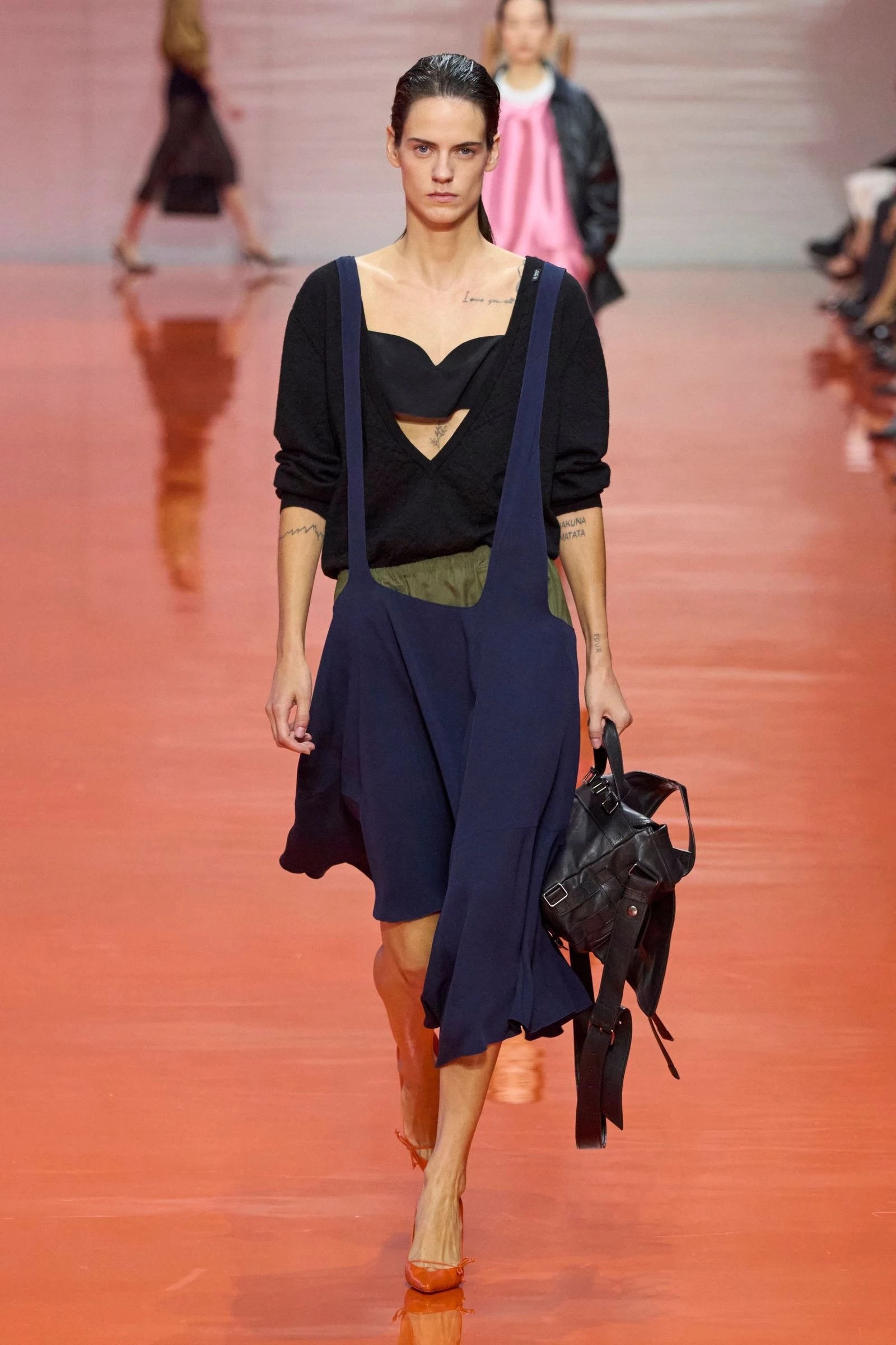 Prada's overall dress is the must-have item for spring/summer '26.
4