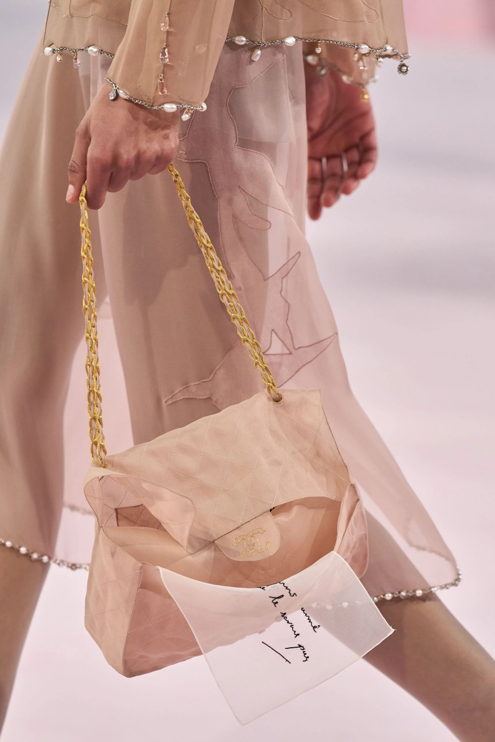 Mathieu Blasi showed a new version of the iconic Chanel bag – weightless and almost transparent1