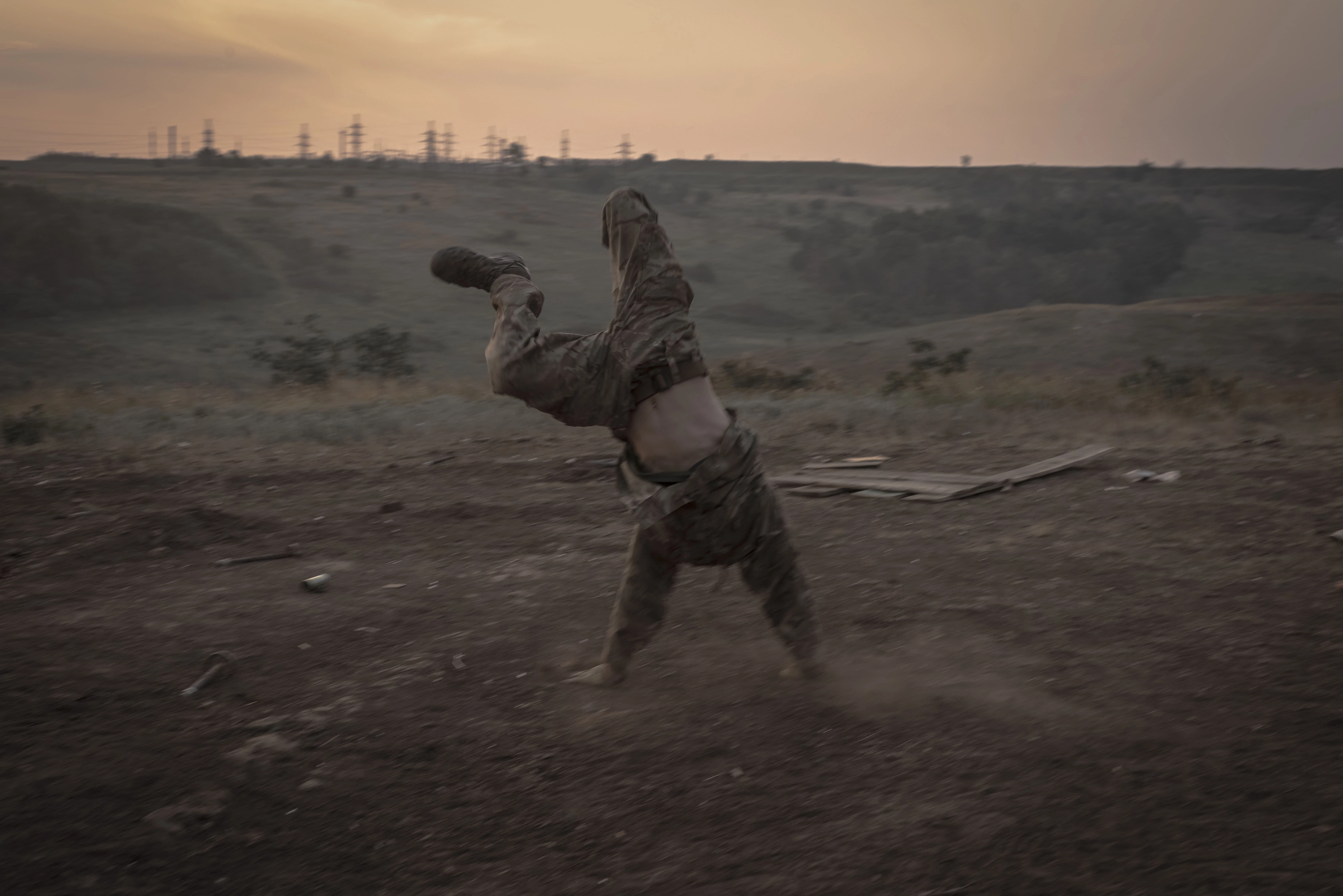A young fighter in positions in Donbas, Donetsk region, summer 2022. Photo: Albert Lores4