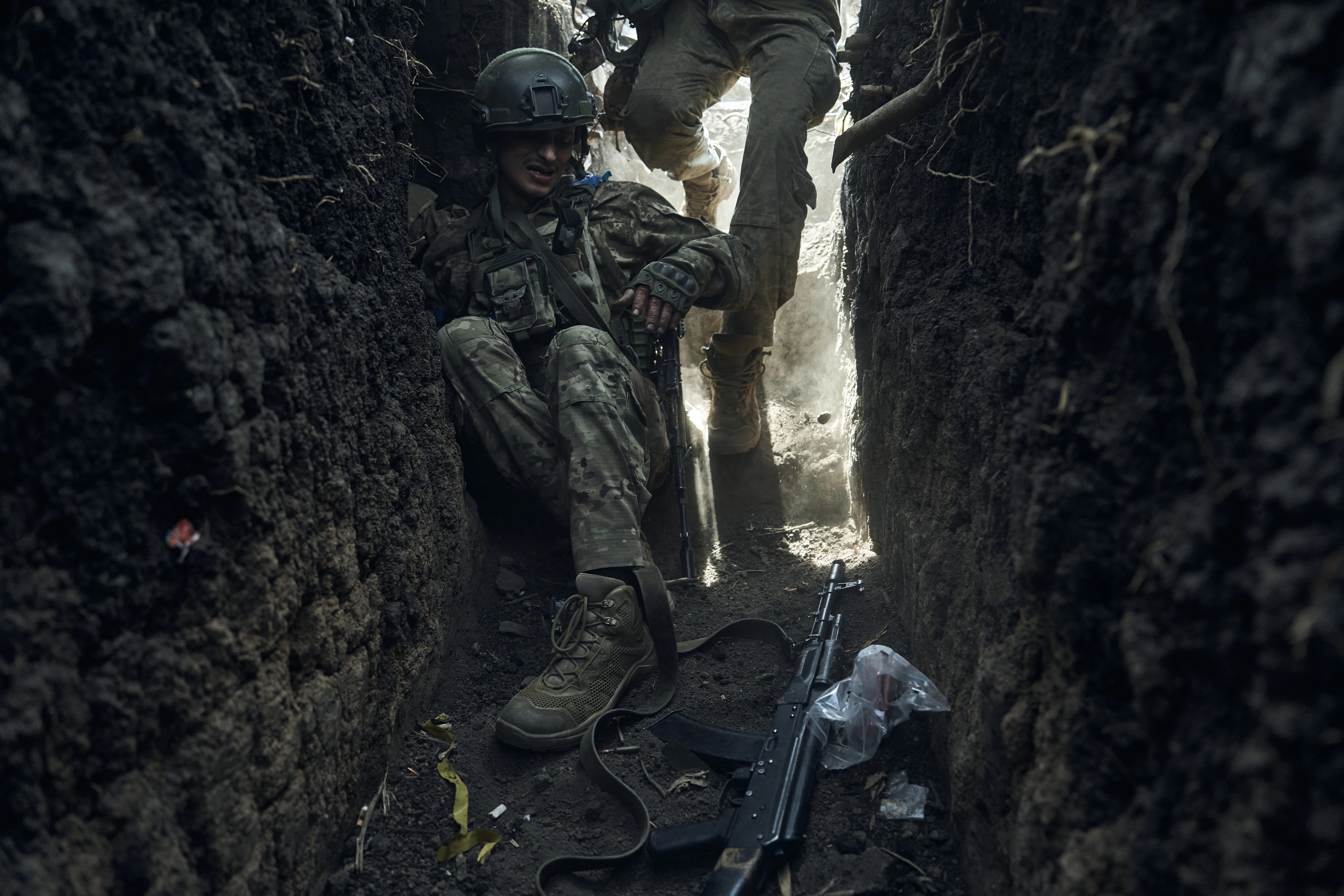 A wounded soldier in a trench in the Donetsk region, September 5, 2023. Photo: Vlada and Konstantin Liberov6