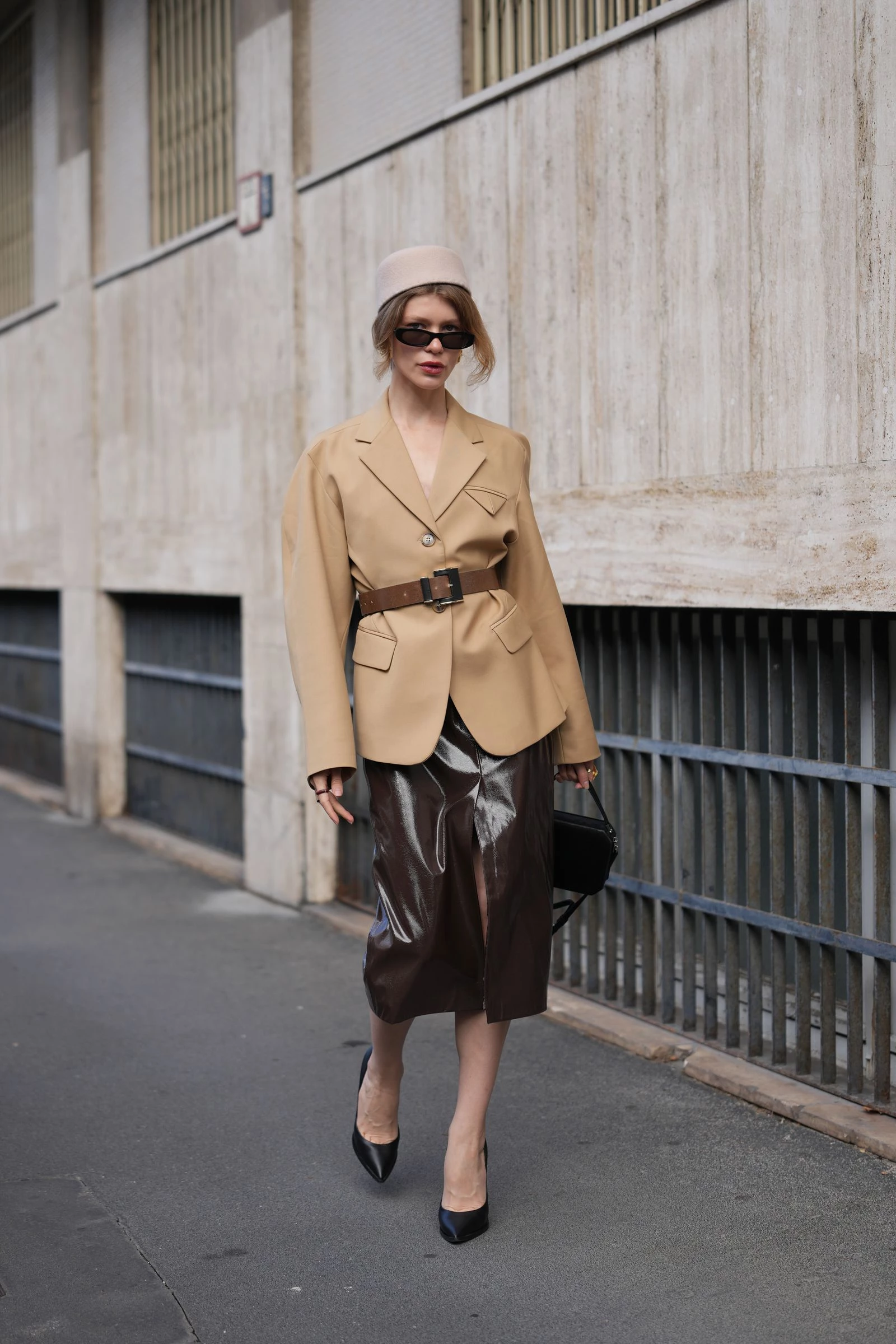 A patent leather skirt is something that should appear in your wardrobe this year9