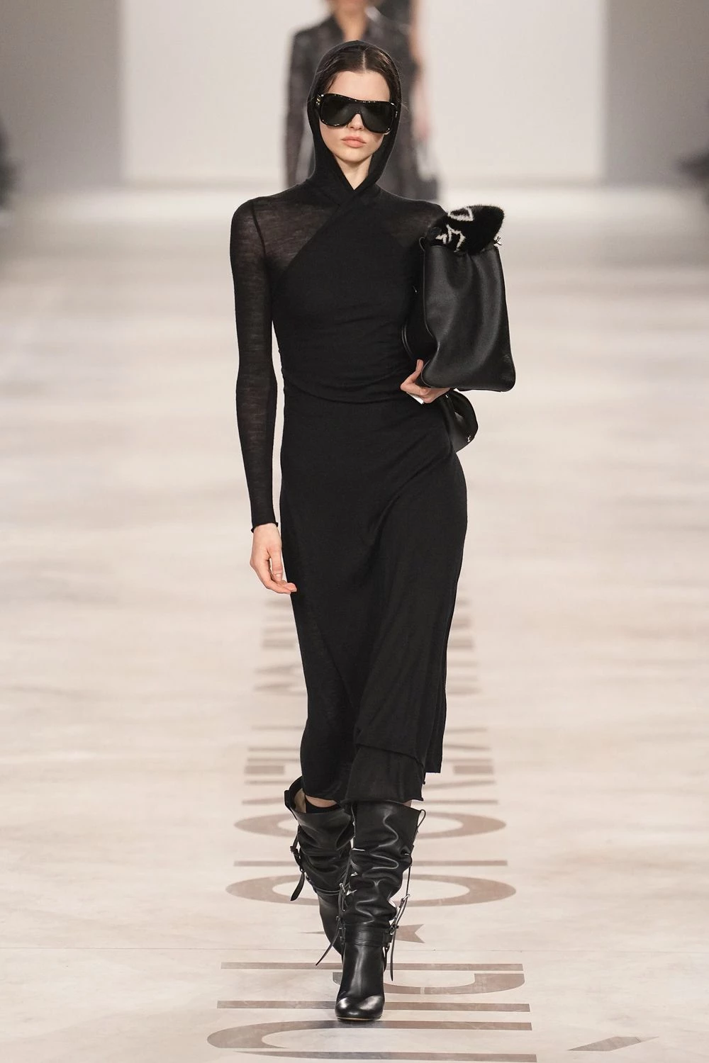 "Less me, more us": Maria Grazia Chiuri's debut collection for Fendi12