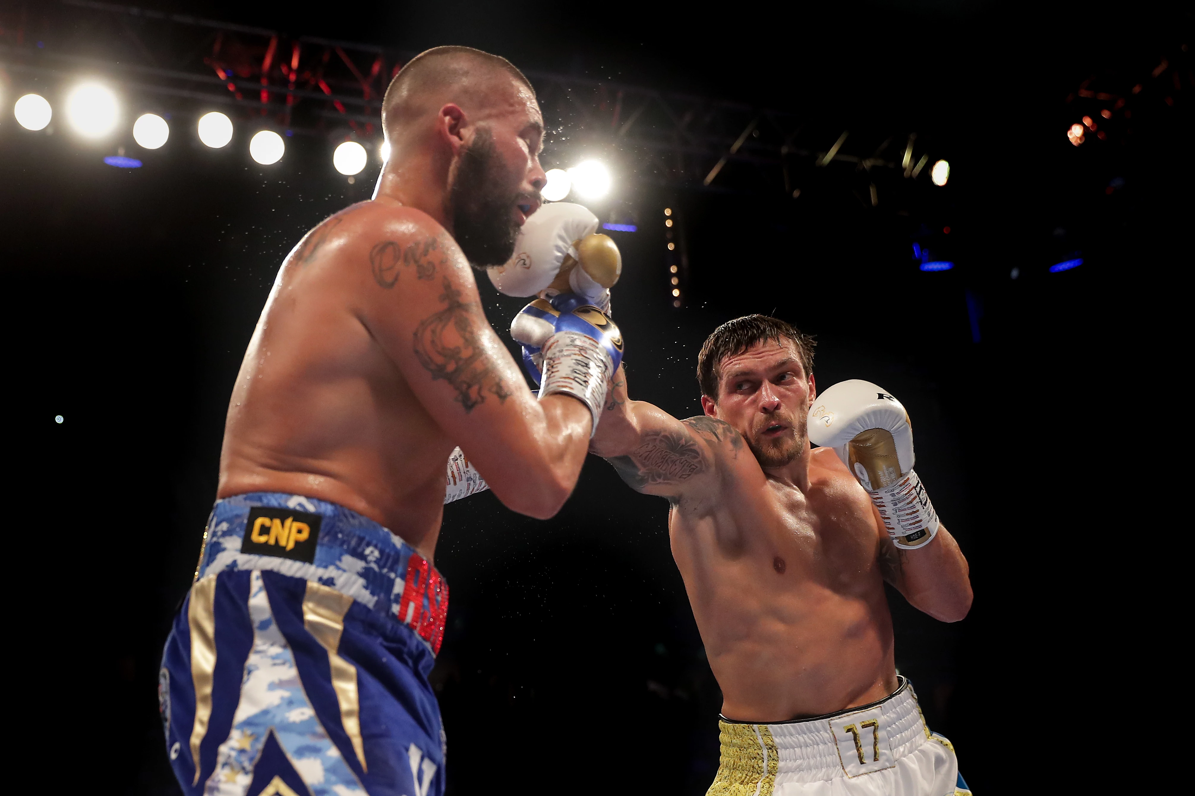 Oleksandr Usyk lands a punch against Tony Bellew during their WBC, WBA, WBO, IBF and The Ring world heavyweight title fight at the Manchester Arena. Manchester, United Kingdom, November 10, 20188