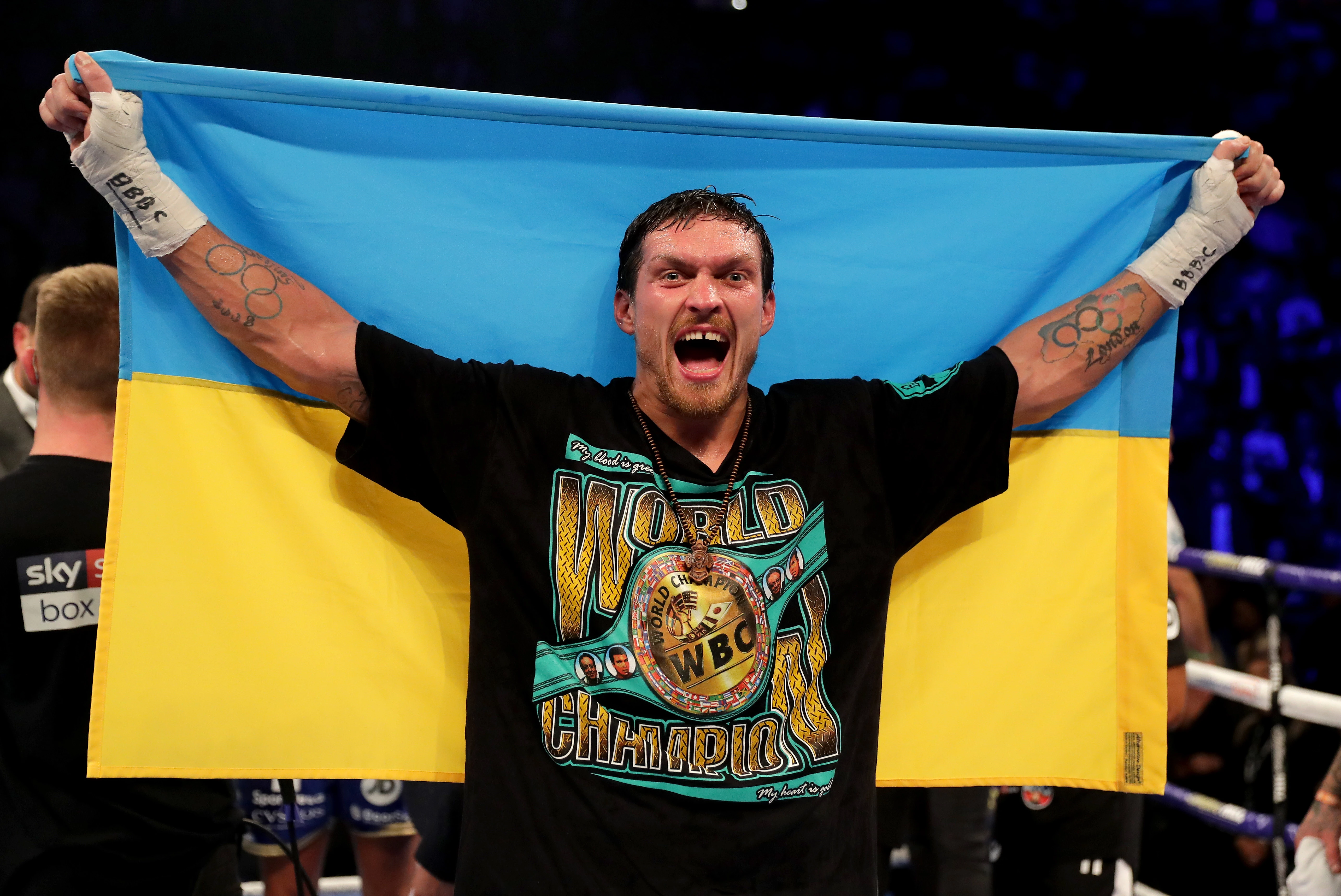 Oleksandr Usyk celebrates his victory over Tony Bellew after the fight for the WBC, WBA, WBO, IBF and The Ring world heavyweight titles at the Manchester Arena. Manchester, United Kingdom, November 10, 201810