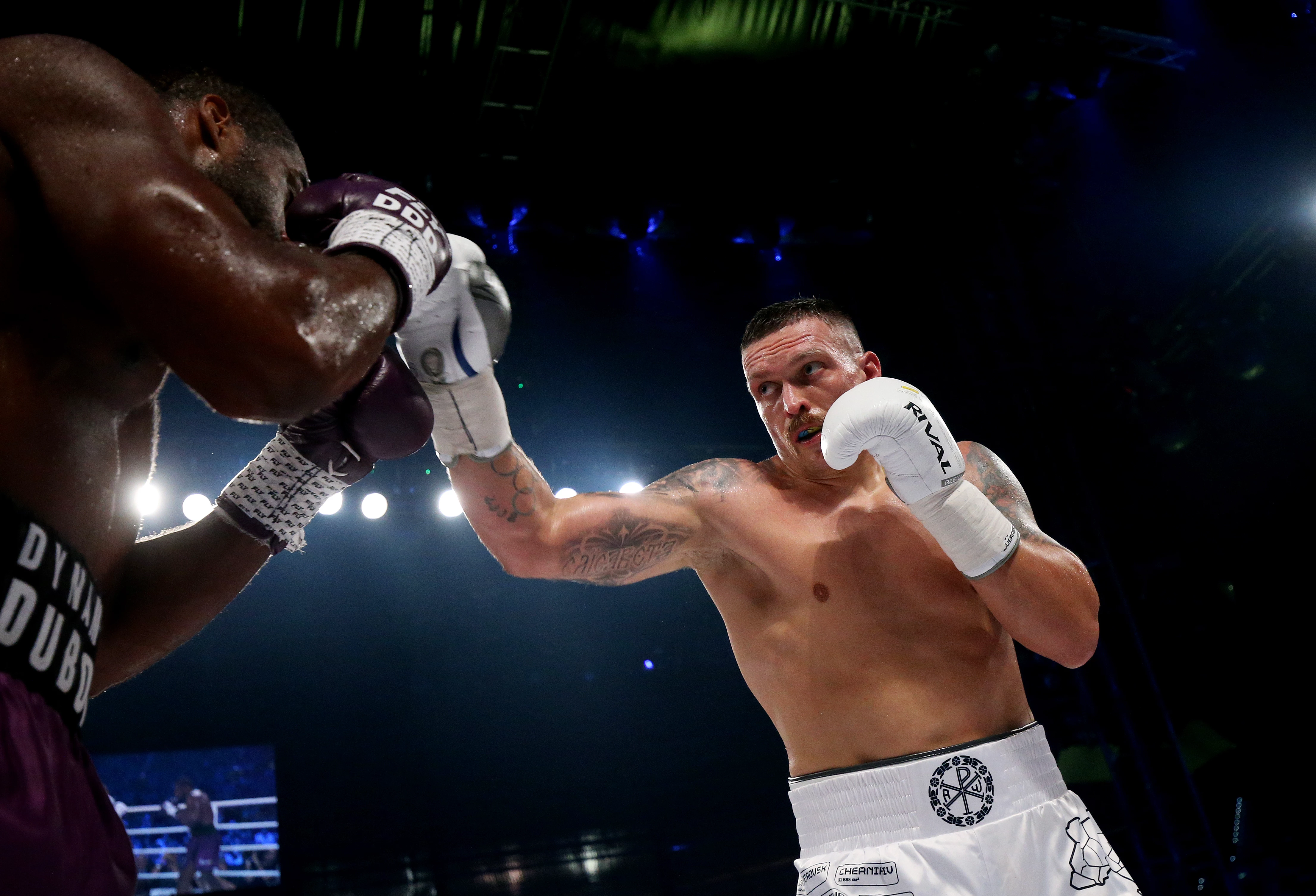 Oleksandr Usyk lands a punch against Daniel Dubois during their heavyweight fight at Stadion Wroclaw. Wroclaw, Poland, August 26, 202316