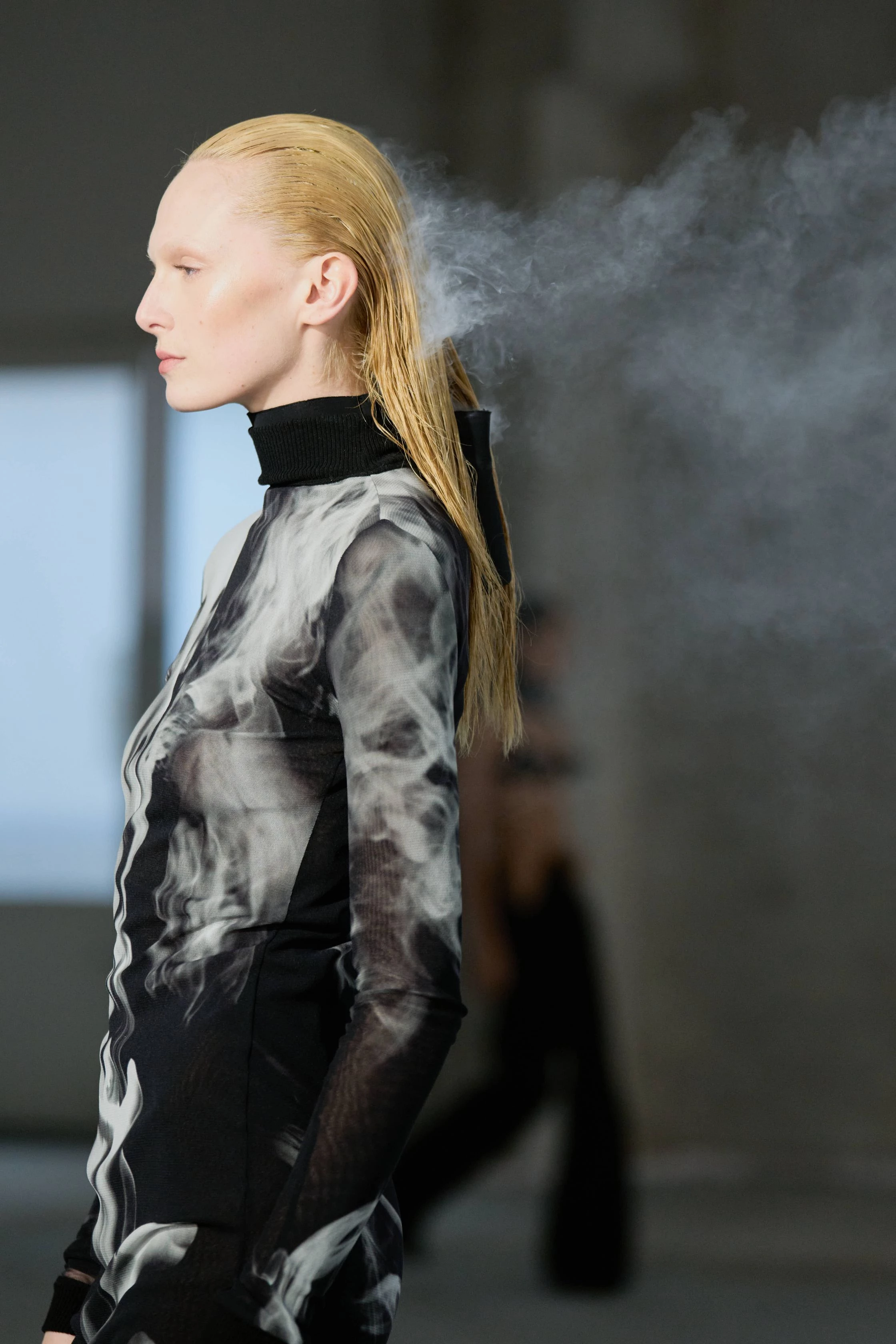 At Jean Paul Gaultier, the model walked the runway with hair that was (literally) smoking.3