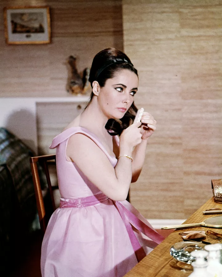 Elizabeth Taylor and her jewelry in the movies9