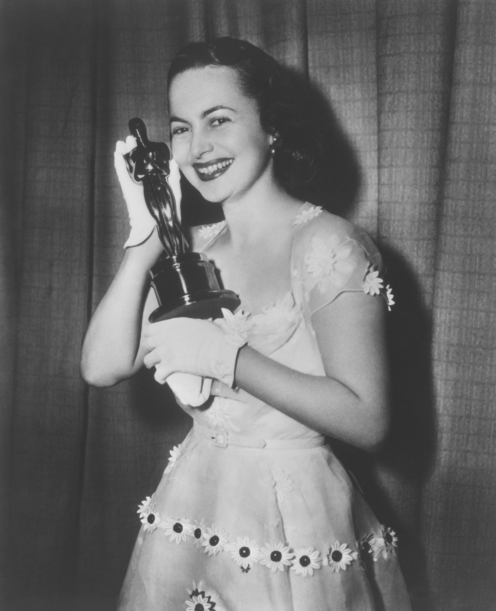 Olivia de Havilland in Orry-Kelly, 195064