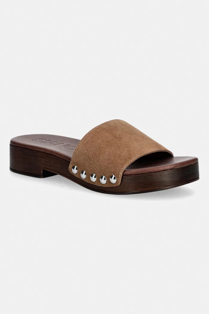 Wooden-soled clogs in the spirit of the 1970s are the key shoe trend of the season11