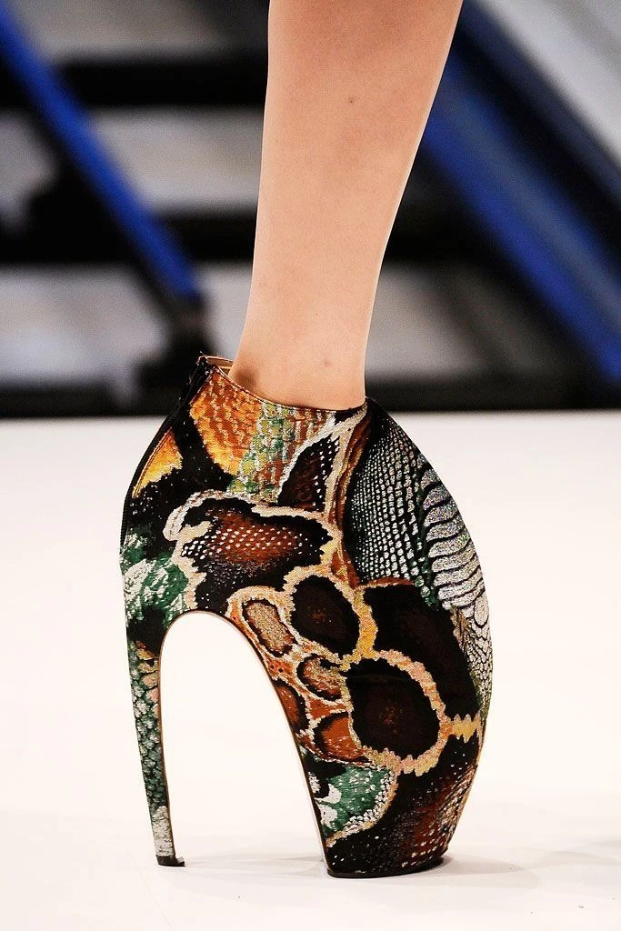 Armadillo by Alexander McQueen, Spring/Summer 2010. The designer introduced the now iconic Armadillo in his latest show, Plato’s Atlantis. Their anatomically challenging, convex shape made the heel instantly legendary.2
